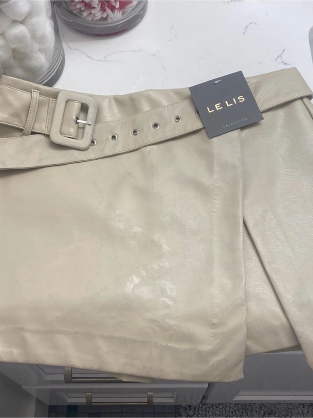 Le Lis Cream Faux Leather Mini Skirt with Matching Belt